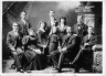 Fred and Charlotte Leader and family; Four standing (from left): Fred jr., Thomas, Jane (known as Gin or Jenny), William. Six seated: Henry, Charlotte, Maud, Caroline (or Carrie), Fred Sr., Robert; shared by gnboreham